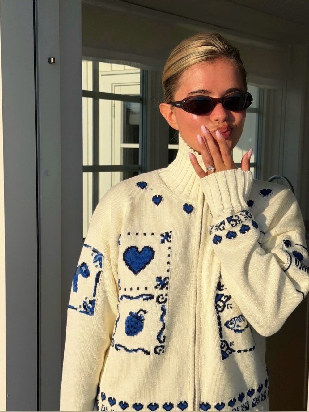 Djerf Avenue Cream Zip-Up Sweater with Blue Heart Motif